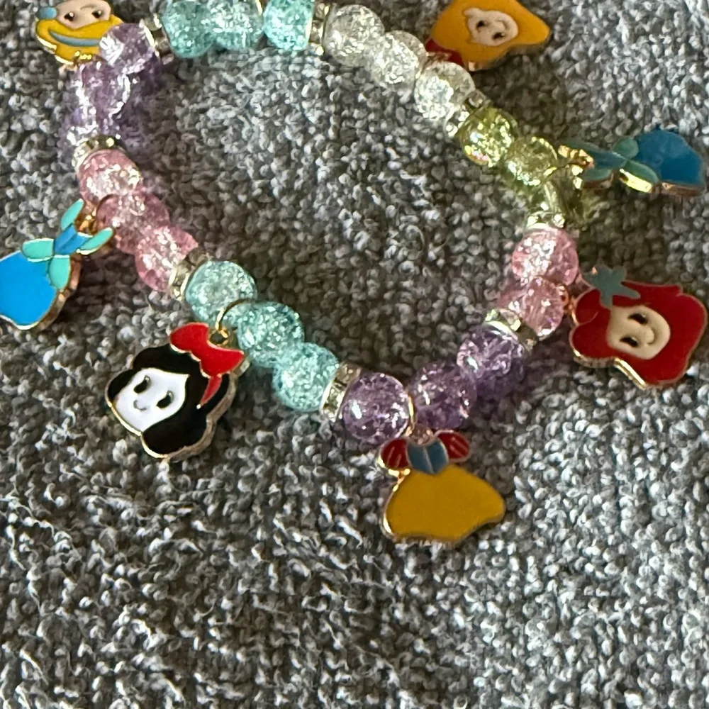 Charming Beaded Bracelet with Character Charms